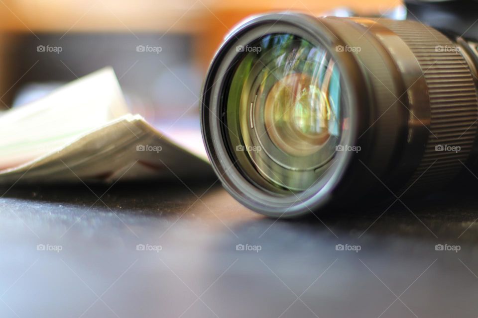 Photo zoom lens on table