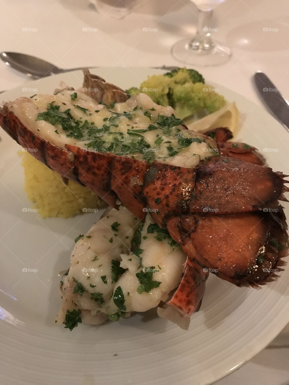 Cruise food yum yummy lobster tail butter garlic parsley meat dinner fancy fine dining lemon broccoli 