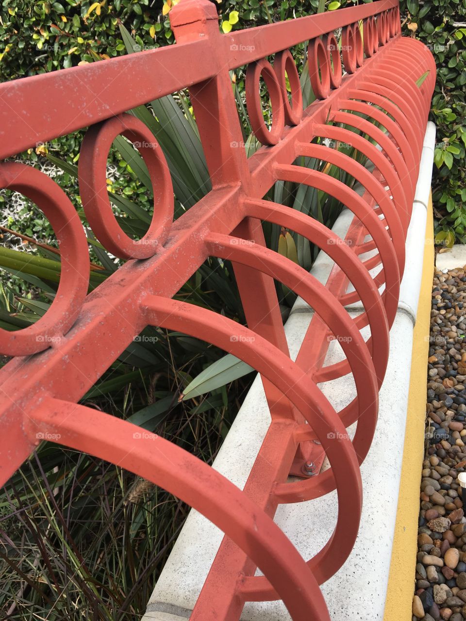 Red metal fence