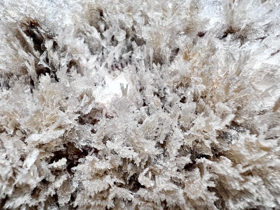 Macro photo of frozen chocolate ice cream in full framed.