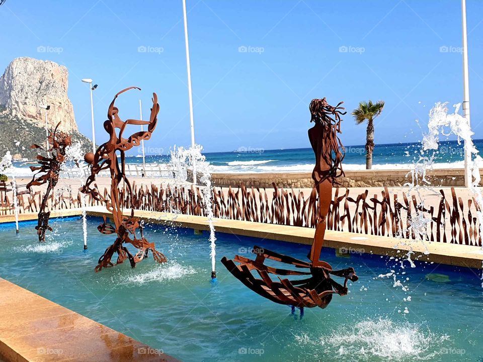 Fountain#beach#sea#rocks#water#palm