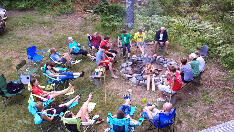 Family. small campfire, big family