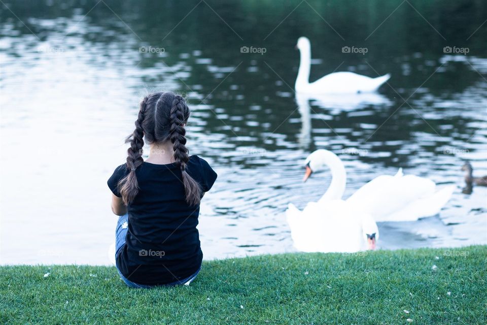 girl and swans