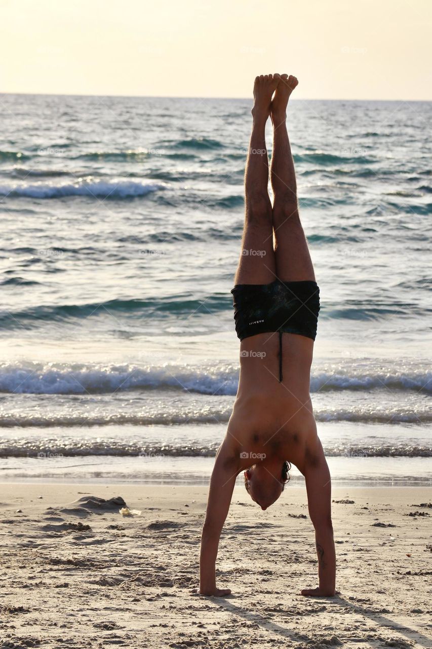 Handstand on the beach
