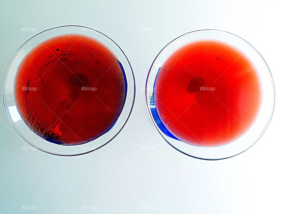 Overhead shot of two red martinis 