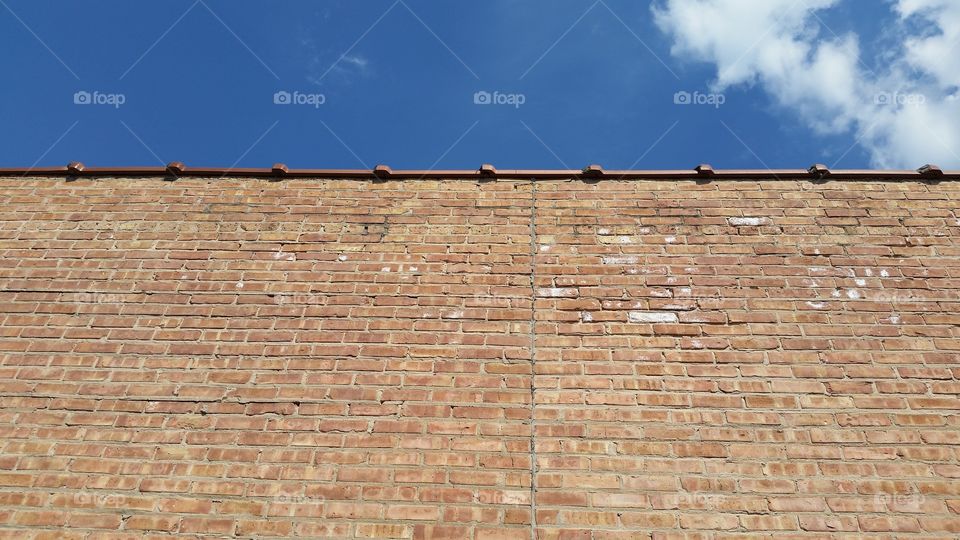 Brick wall and sky