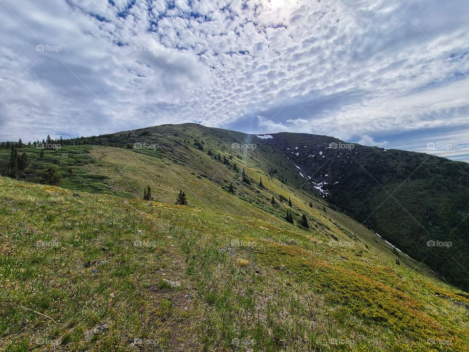 Beautiful clouds forming over the ridge