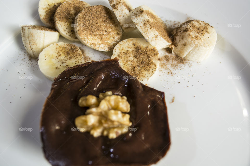 Chocolate cake and bananas with cinnamon
