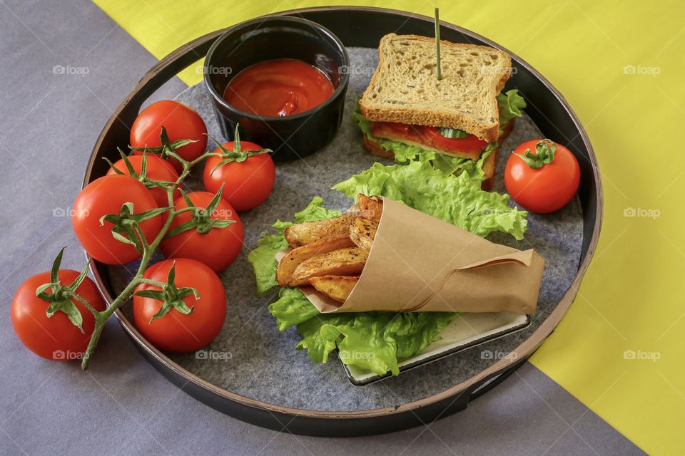 fried homemade potato and sandwiches with tomato ketchup