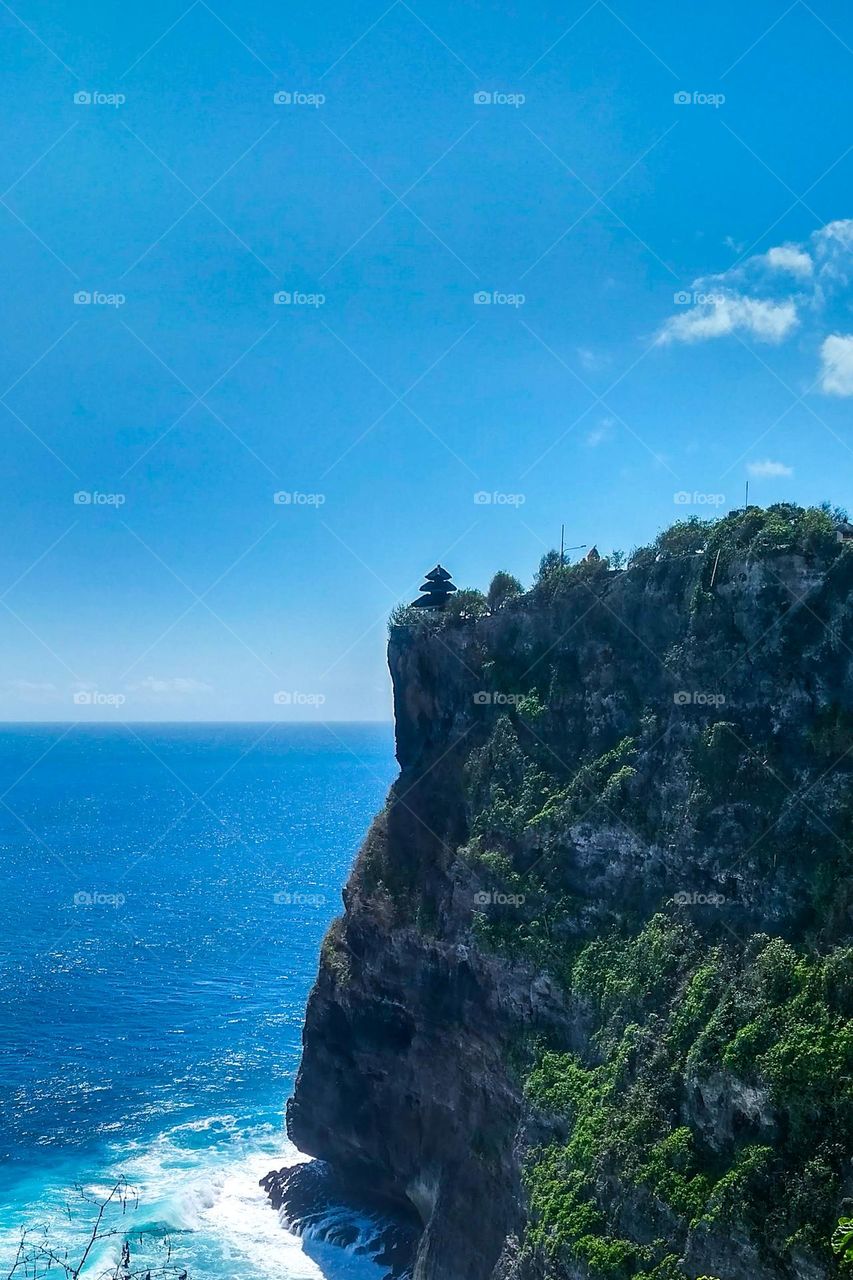 Rocky cliffs towering above the sea in high angle view