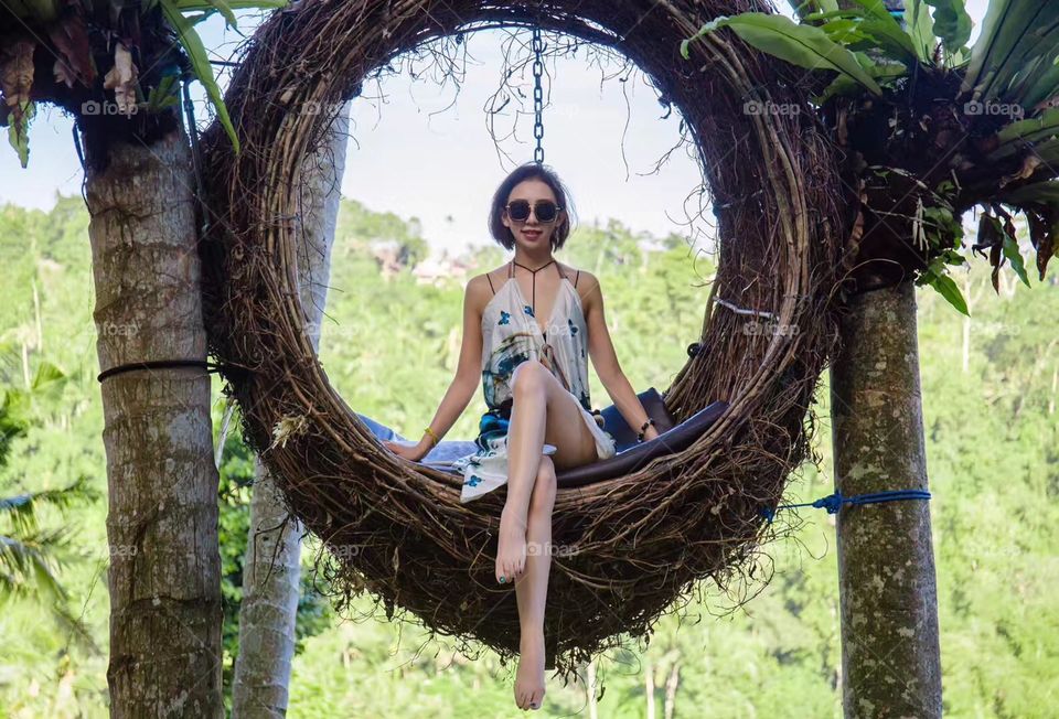 Bali Swing in Indonesia , high , surrounded by a forest. Nice View.