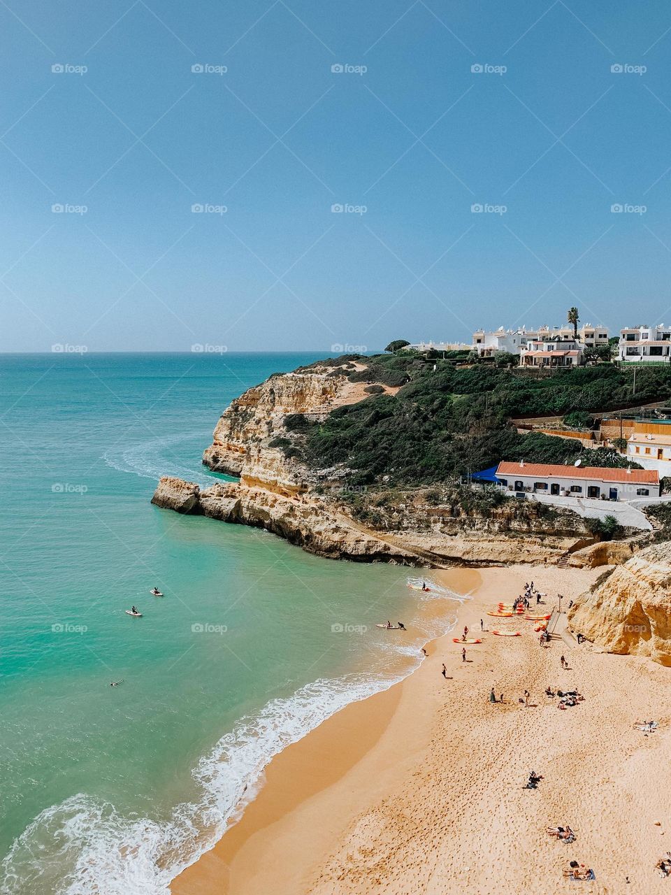 People on the beach in benagil Portugal. 