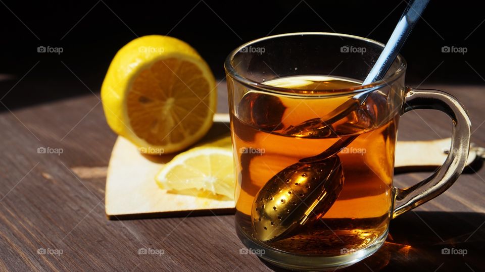 A glass cup on table