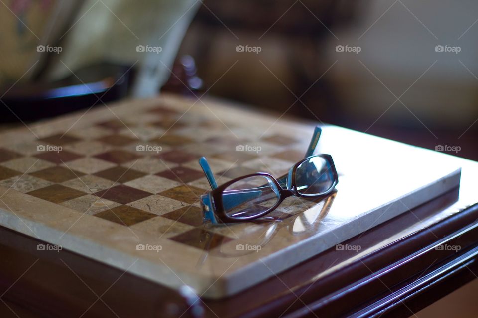 Chess board and glasses