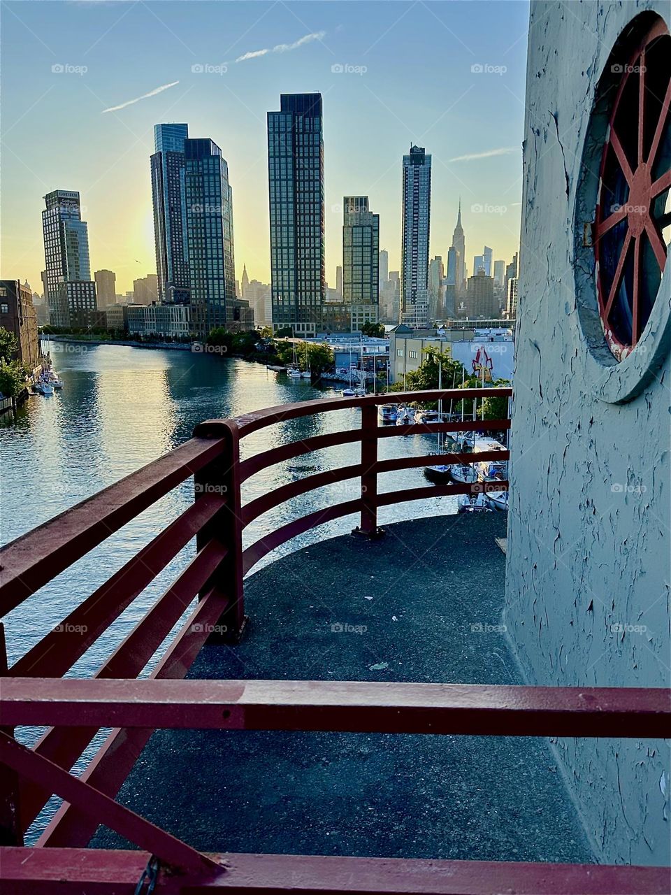 This is the center outpost of the “Pulaski Bridge” at “Newtown Creek”, an ocean inlet of the “East River” connecting “Greenpoint”, Bklyn to LIC, Queens. Across the water we see “Greenpoint”, LIC and “Manhattan”. 2024. Hypnotic Productions