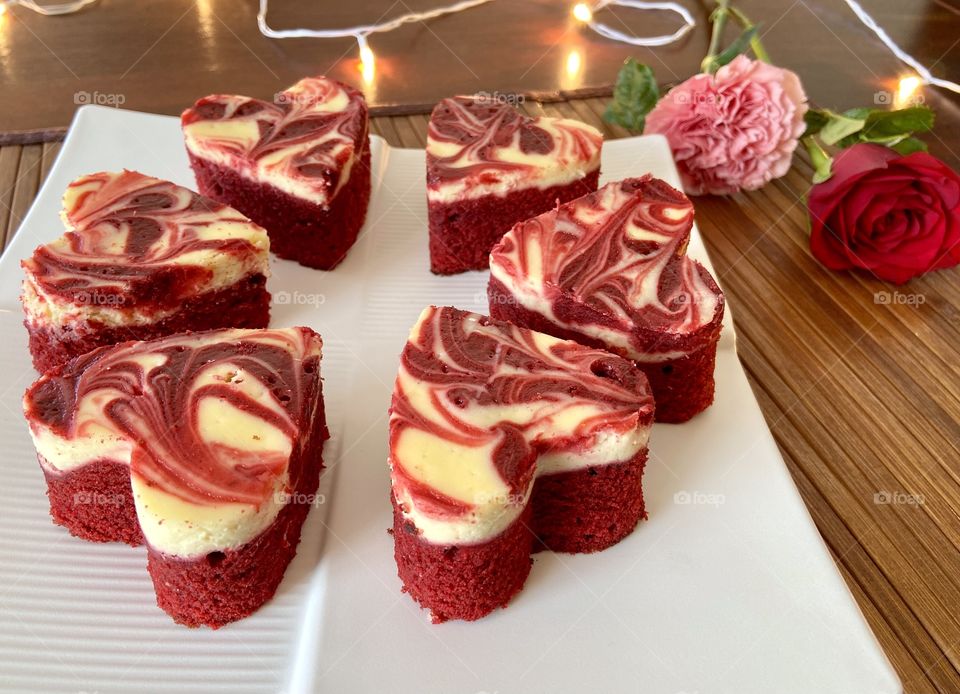 Red velvet cheesecake brownies cut in heart shape!