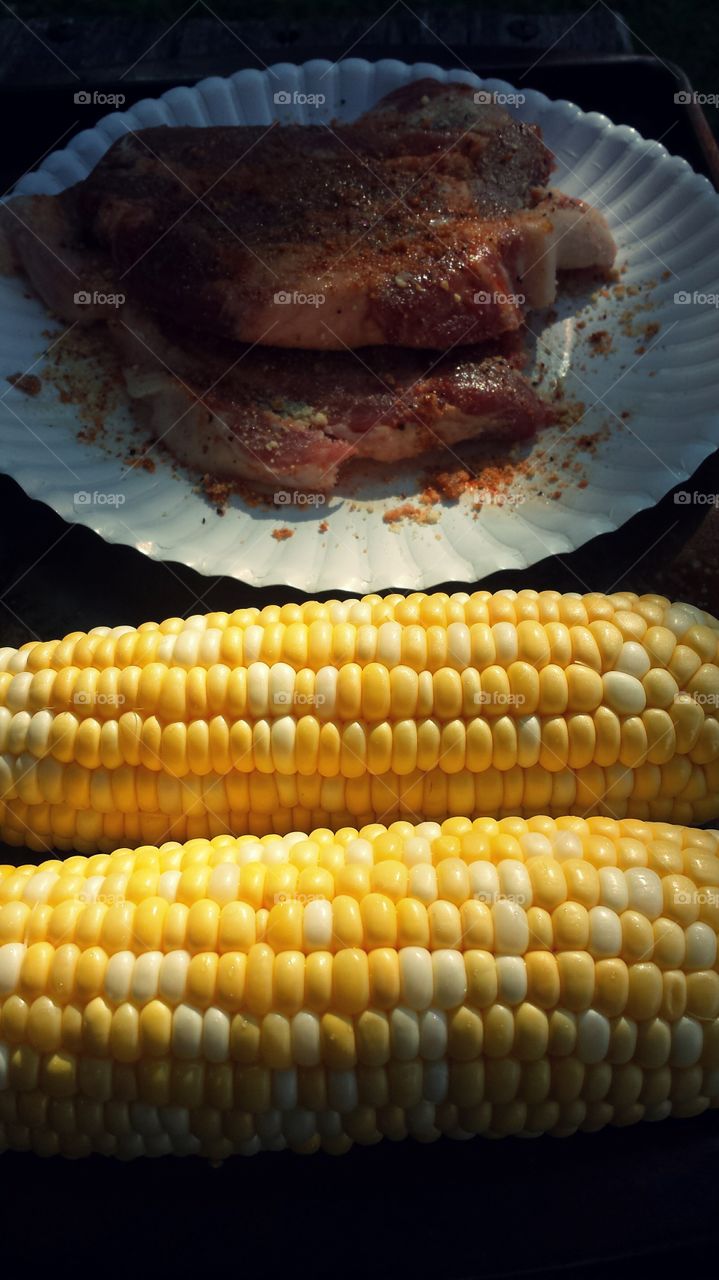 Grilling. Meat and corn