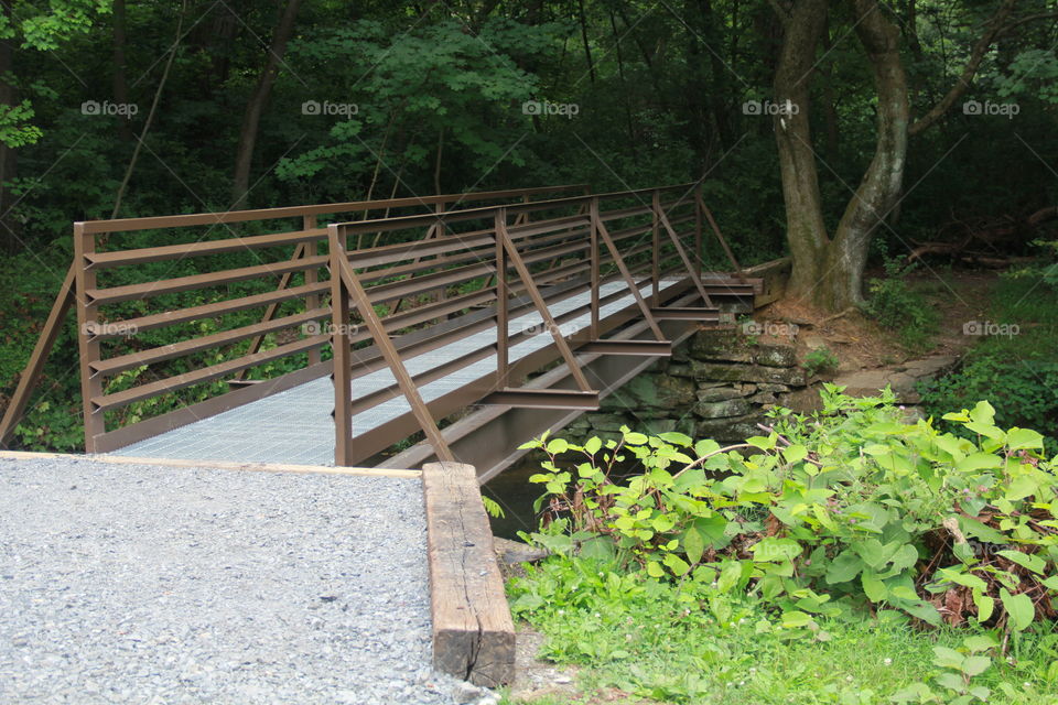 metal bridge on trail