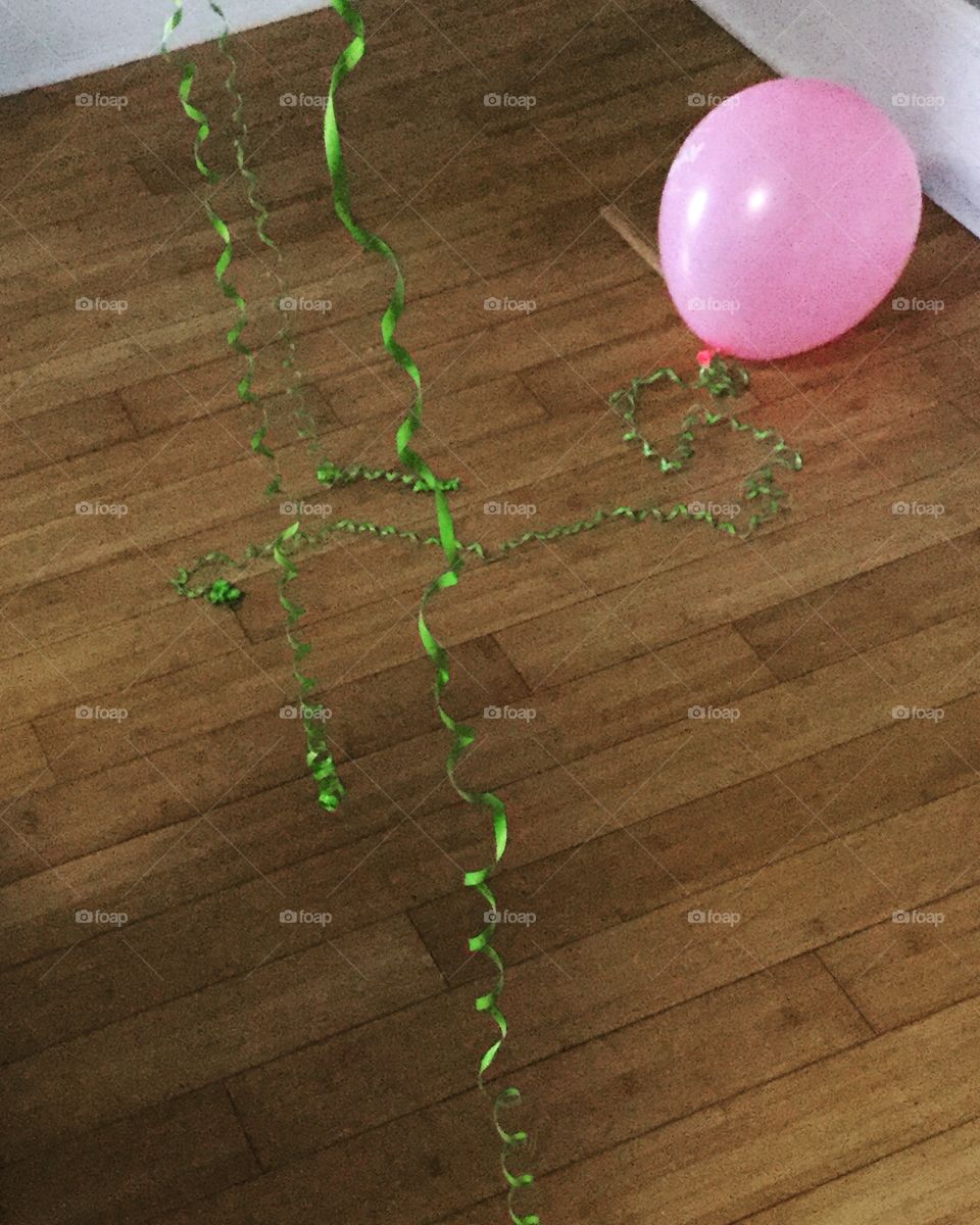 After party. Balloon decoration fallen to the floor. 