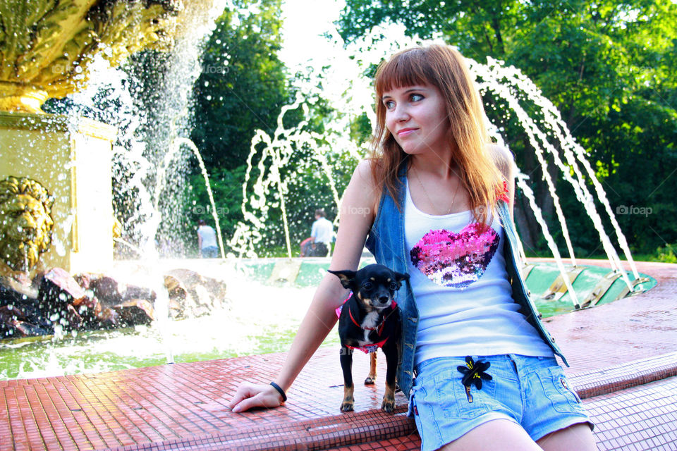 walk with the dog at the fountain