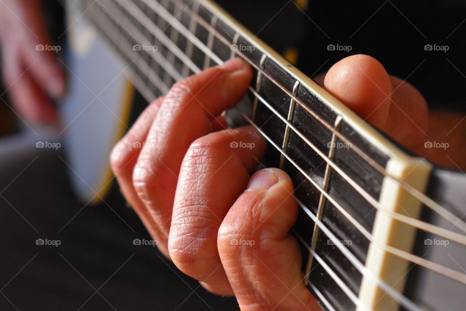 plays guitar