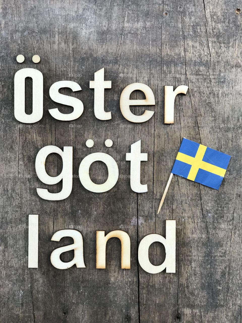 Östergötland county with national flag, Sweden