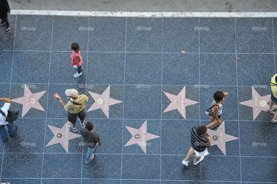 Looking down on Hollywood Blvd famous Walk Of Fame California.
