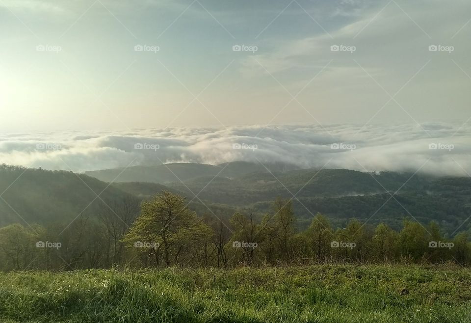 Mountain views overlooking foggy valleys.