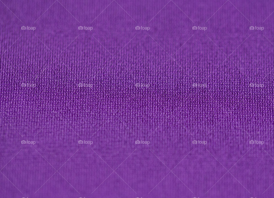 Extreme close-up of purple fabric