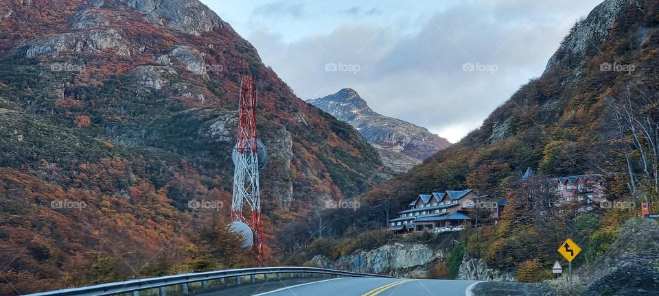 national ruta sourrounded by mountains and a cloudy sky