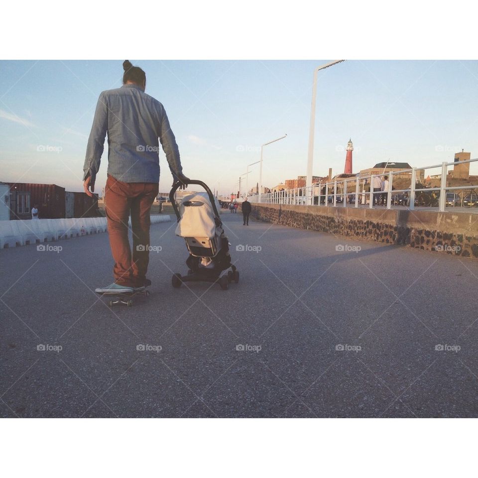 Skateboarding with baby