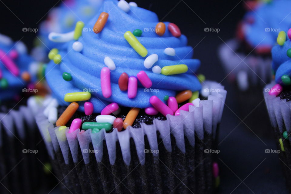 Chocolate cupcakes with blue icing