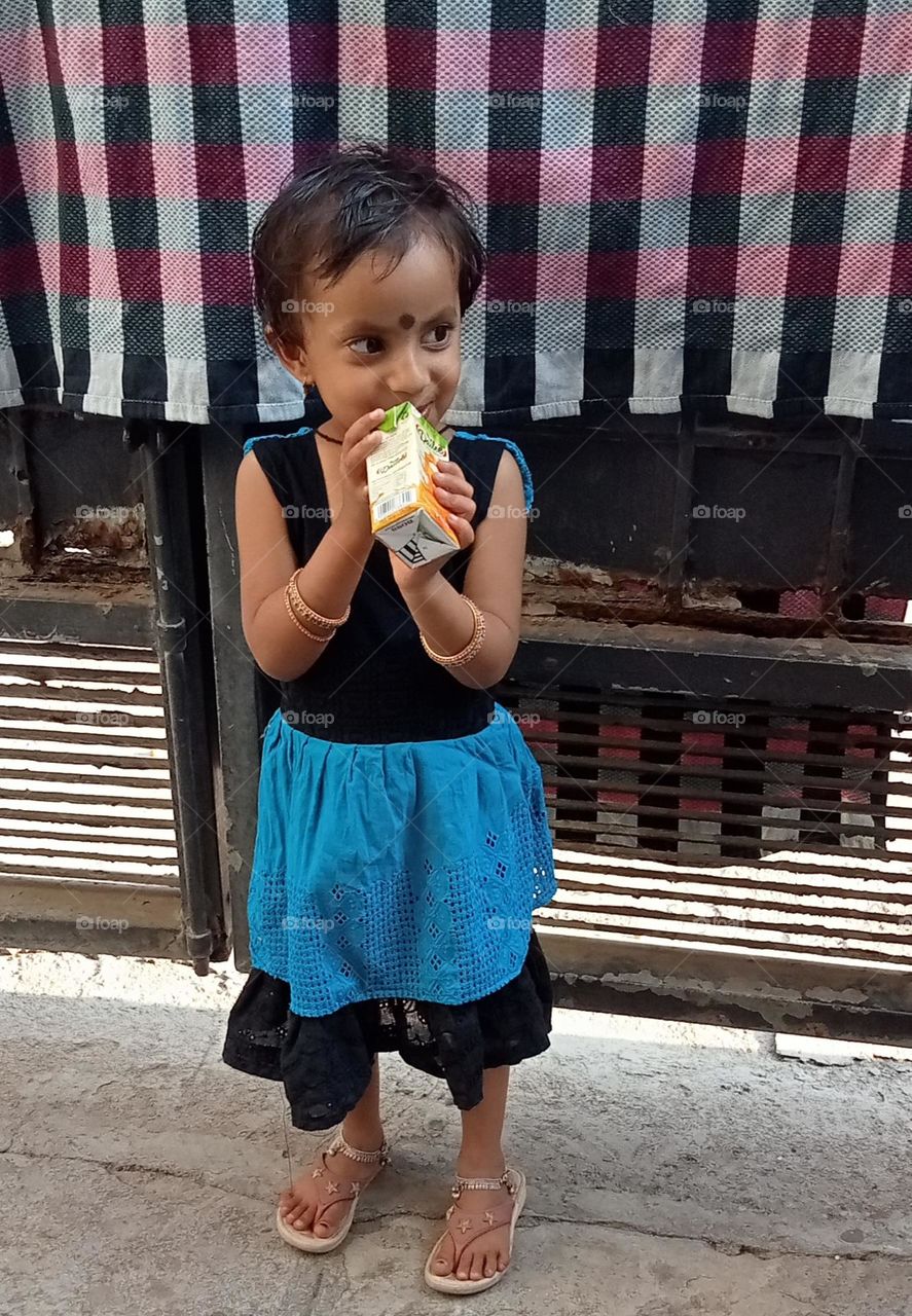 She is sweet little girl ☺️ she is very happy now, because she gave her mumma her favourite drink, 🧃 it's so tasty, 😋 healthy ?? too??