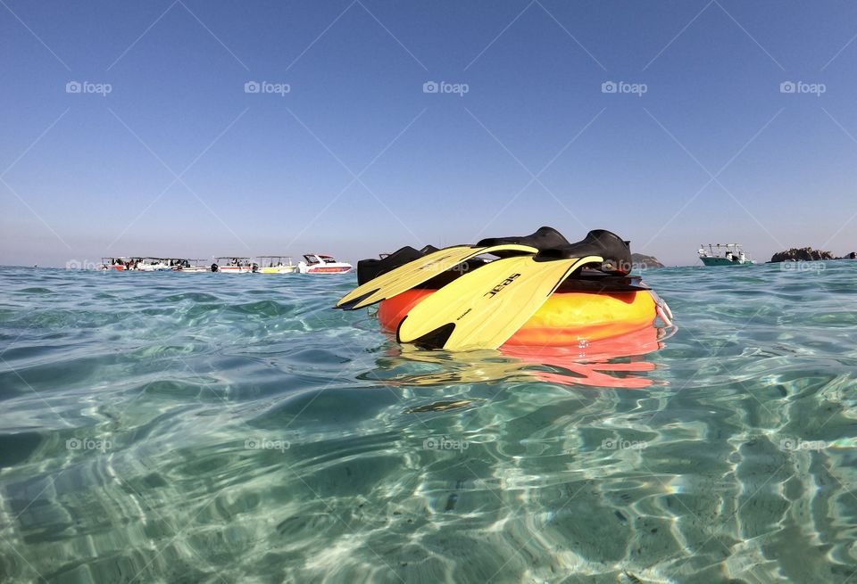 Sattahip,Chon Buri/Thailand-November 24 2019: Rubber rings and fins of Diving trip at beautiful under world , Samae San island