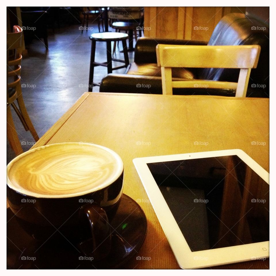 Enjoying my latte and technology 