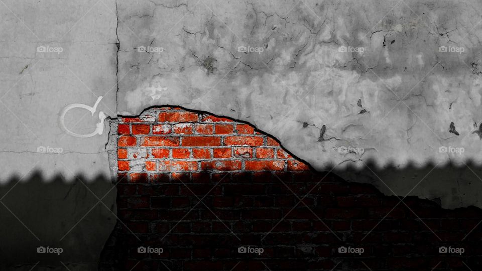 wall crossed by shadow