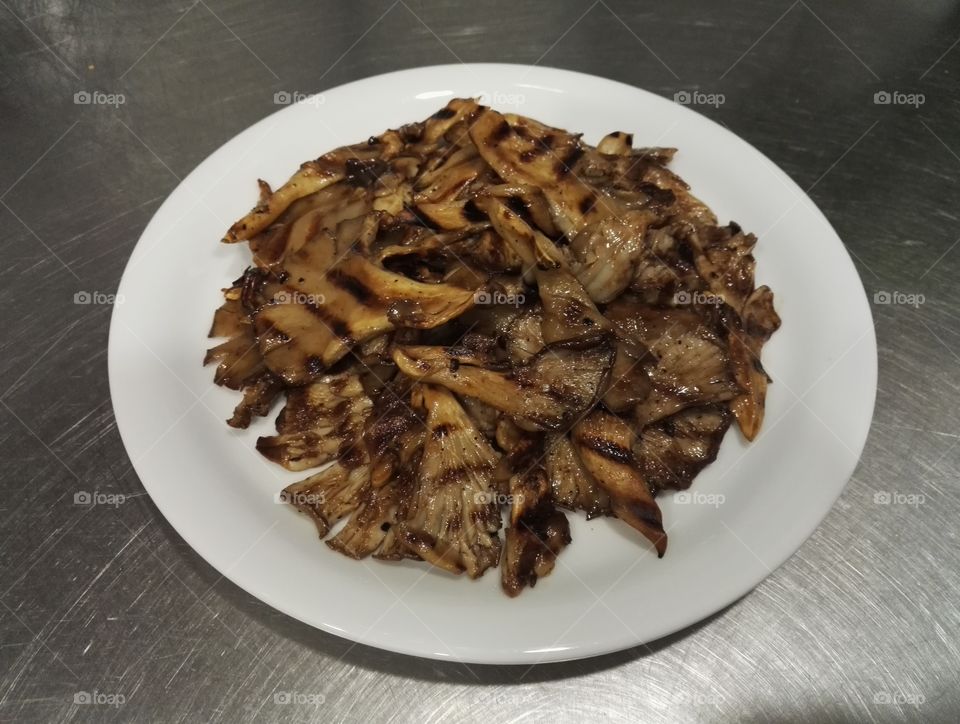 grilled mushrooms plate closeup