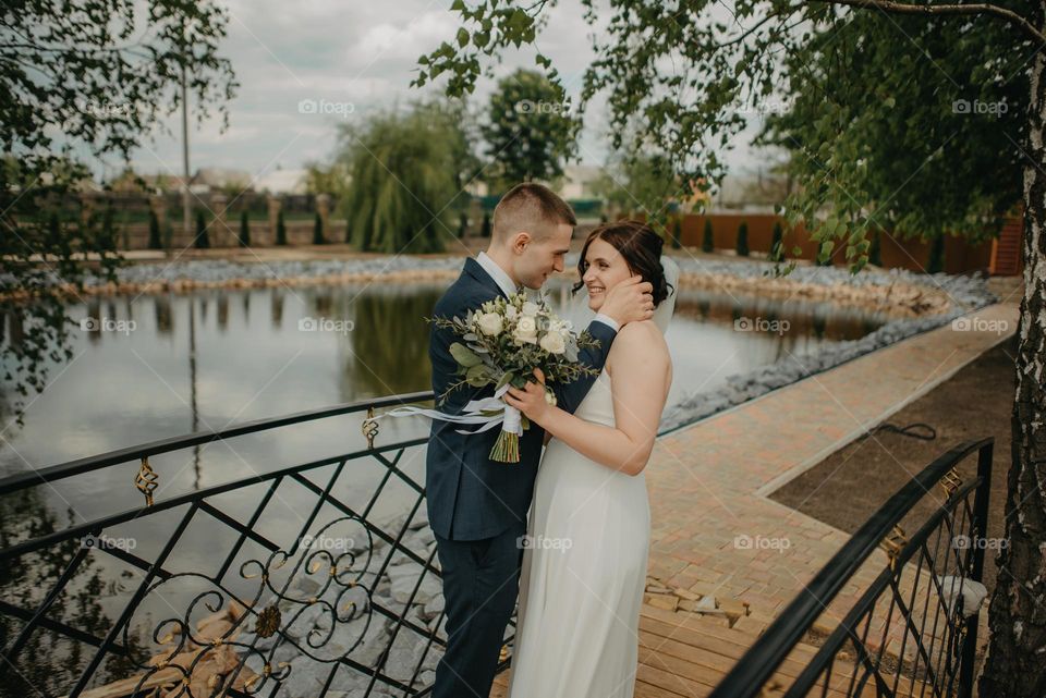 The bride and groom during a photo session