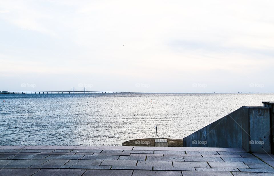 Empty bridge and empty jetty on a cold day