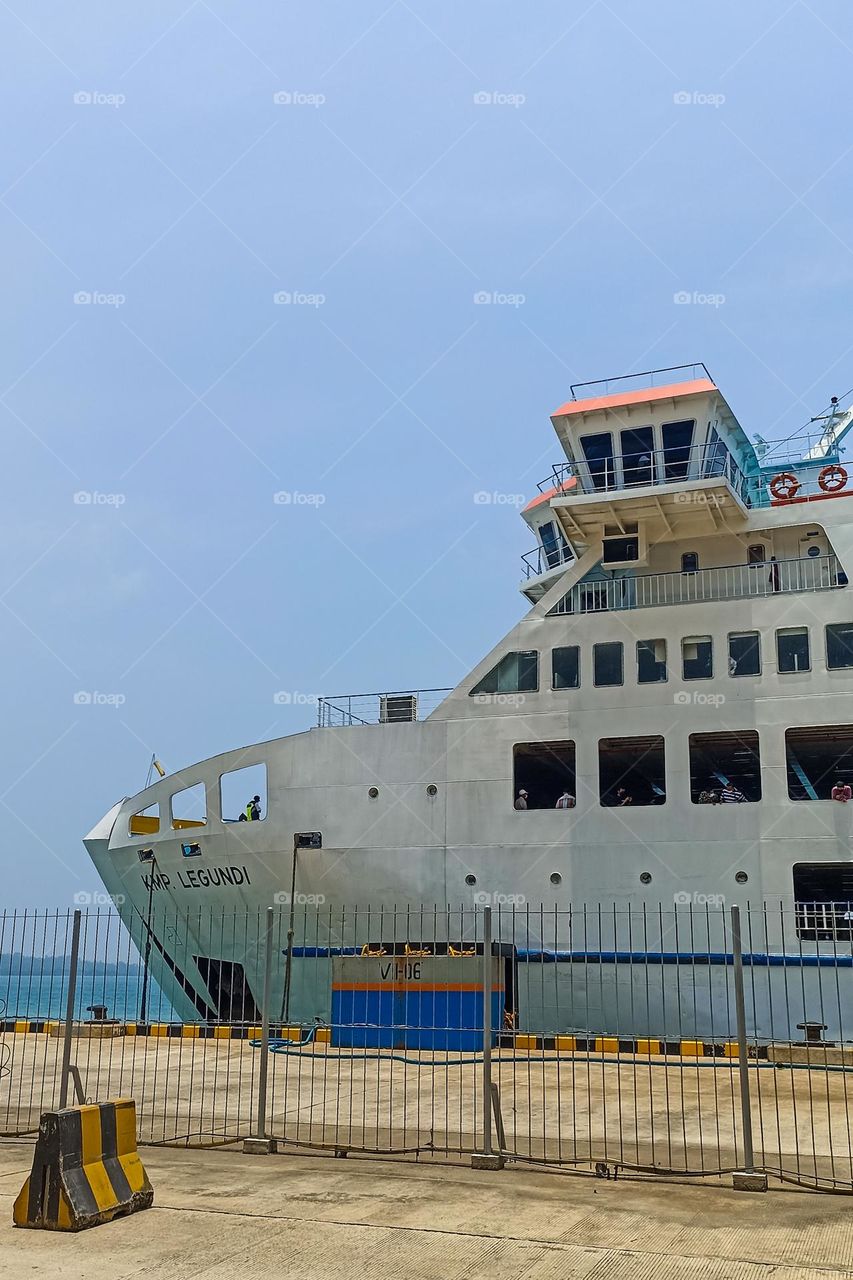 The ferry is docked at the pier of Bakauheni port, Lampung, Indonesia