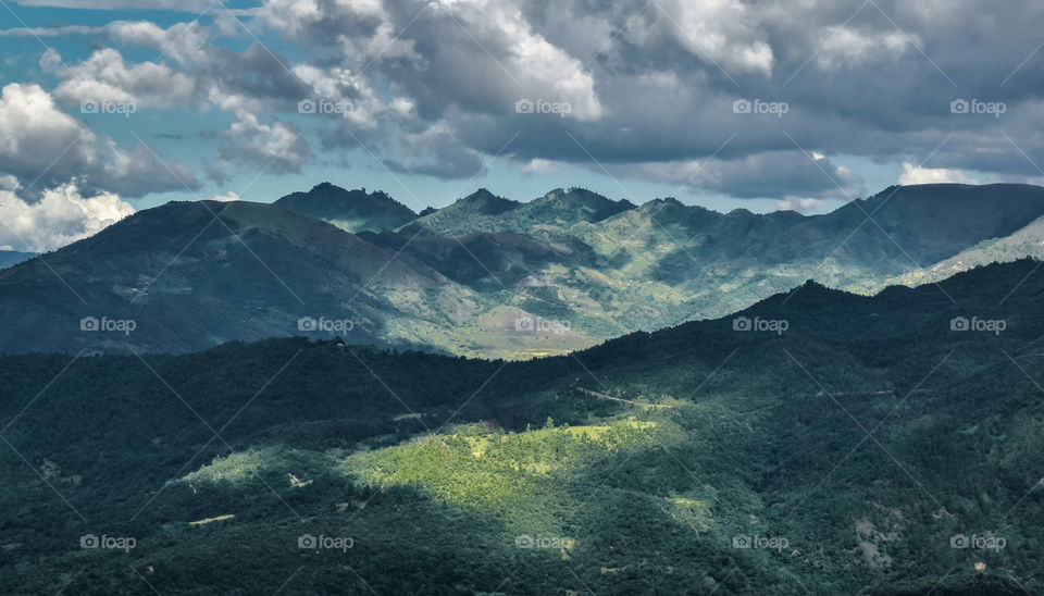 Clouds over the mountains of Ukhrul creating a beautiful game of light and shadows.