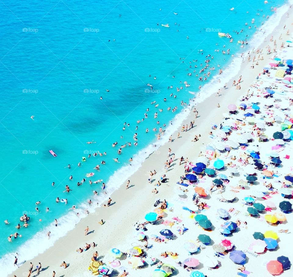 in the sea or on the beach in Tropea