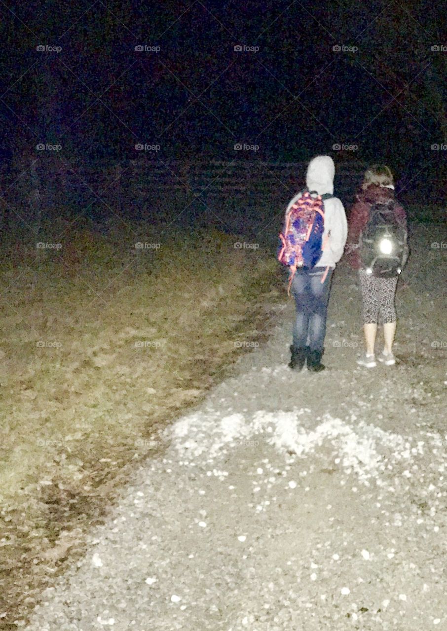 Winter Story, morning, dark, darkness, cold, winter, bus stop, waiting, off to school, kids, back pack, gravel, rural, road, fence, cap, hat, coat, 