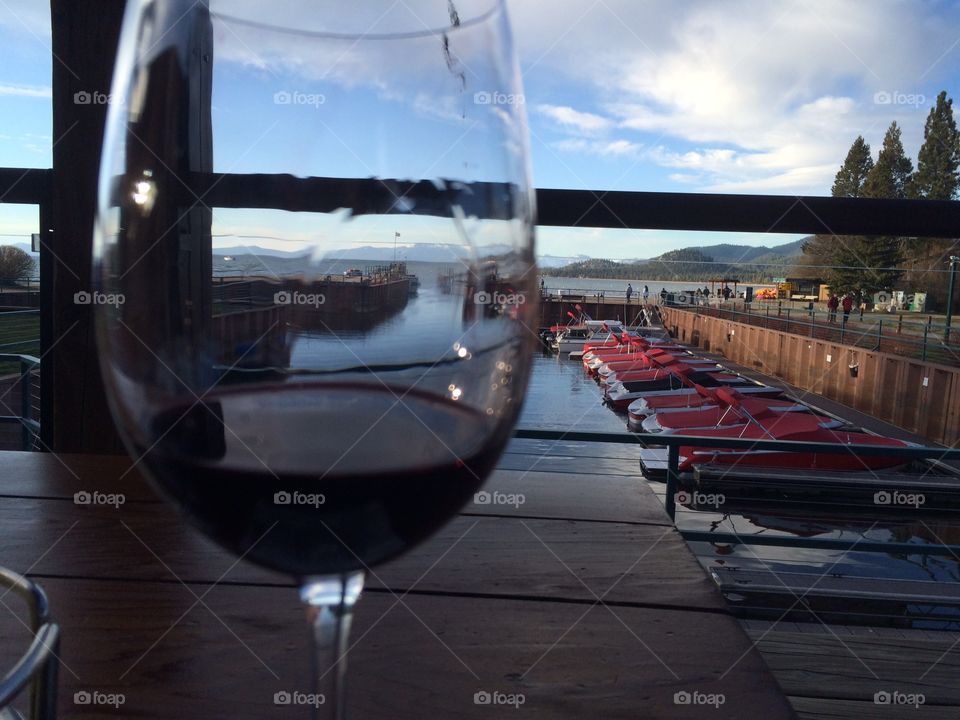 Glass of wine on a marina
