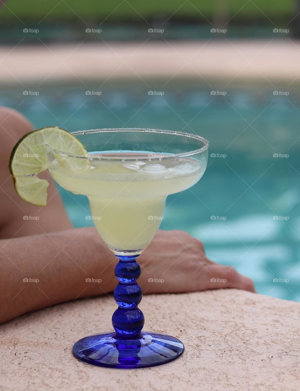 Summer fruity Margarita drink chilling by the pool 