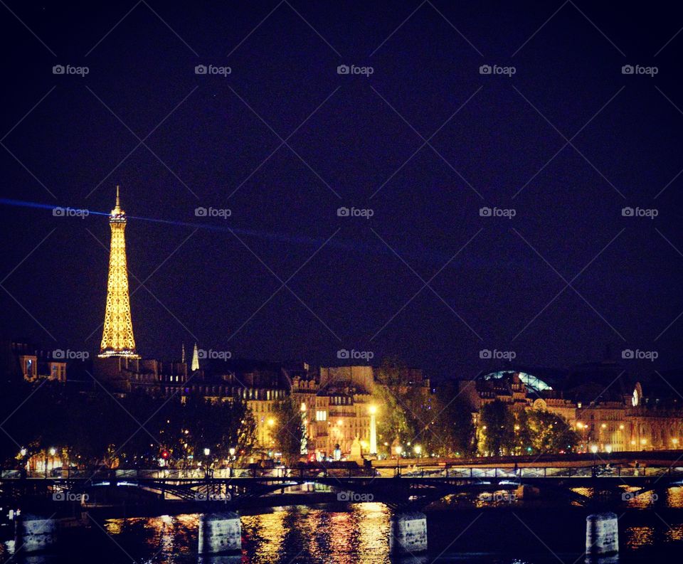 The Eiffel Tower at night.