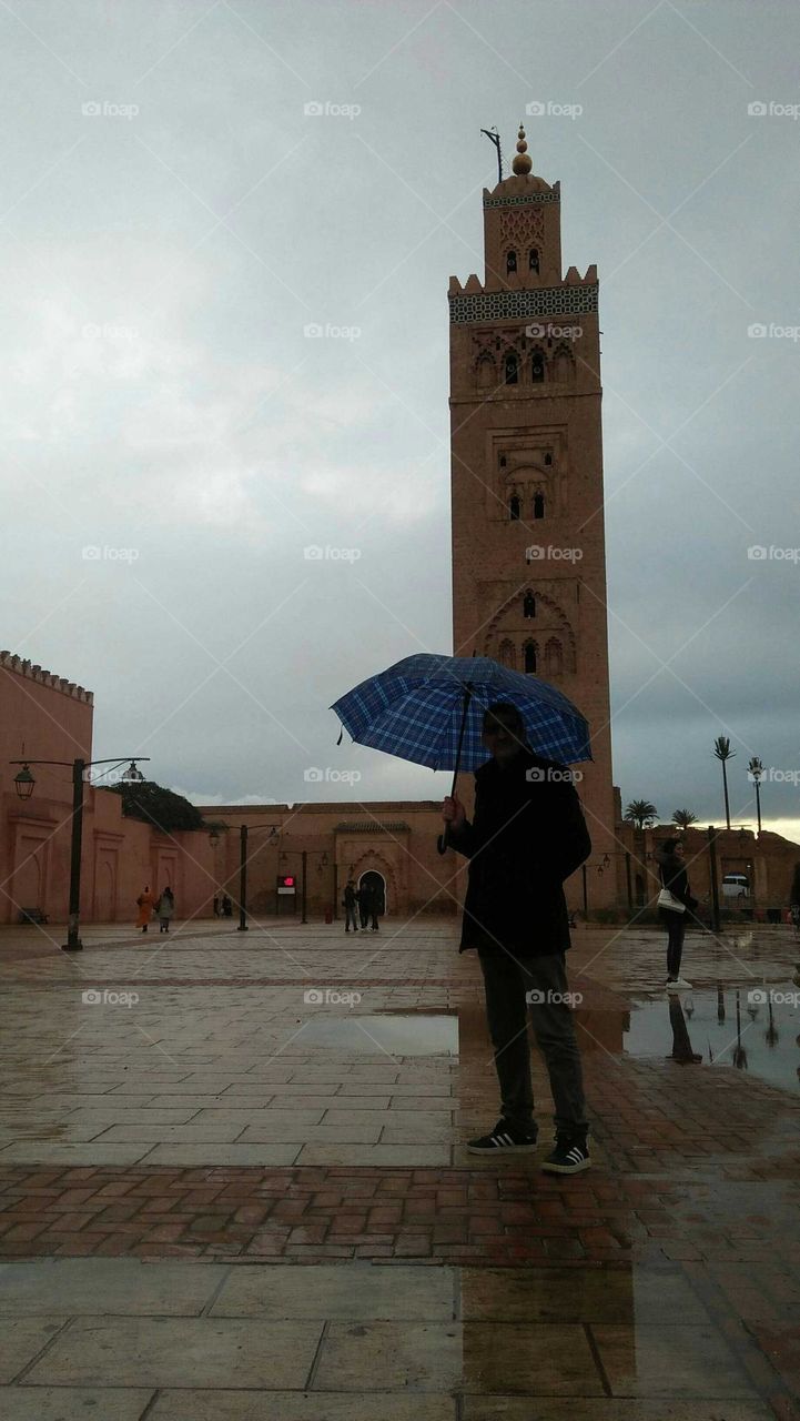 I m standing in the famous square and minaret in marrakech city in Morocco.