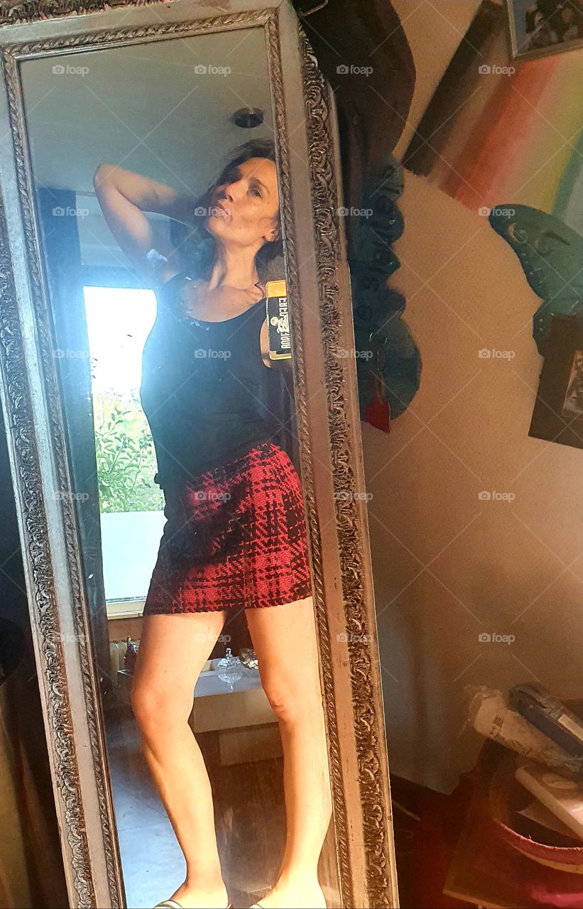 In front of the mirror on a beautiful summer morning