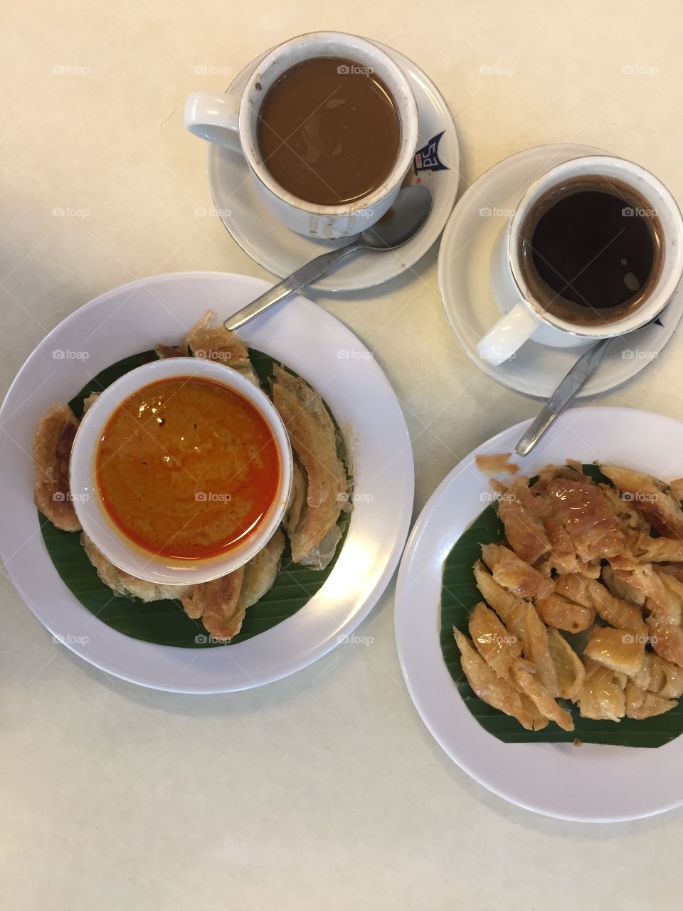 snack of west sumatra Restaurant calls Roti Cane eaten with curry sauce with coffee C