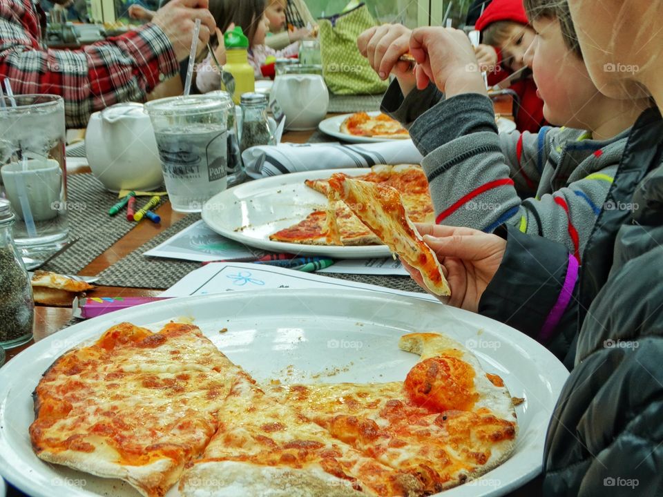 Family Eating Pizza
